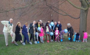 People holding shovels for a photo shoot at the ground breaking ceremony for the new YWCA Supportive Housing building at Lincoln Road, Waterloo